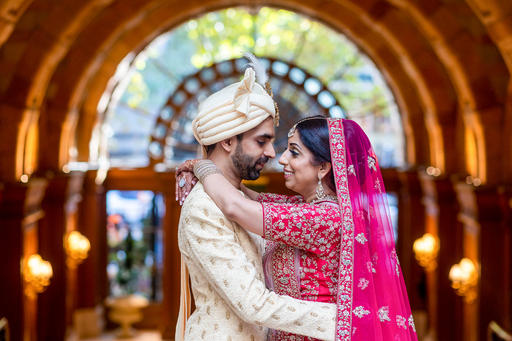 Asian Couple Posing after their Hindu Wedding Ceremony at London Landmark Hotel