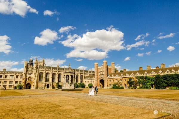 married couple walking on the grounds of the Trinity College