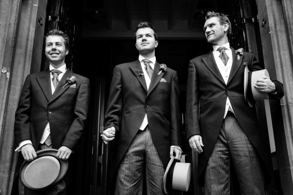 Groom and groomsmen waiting for the bride