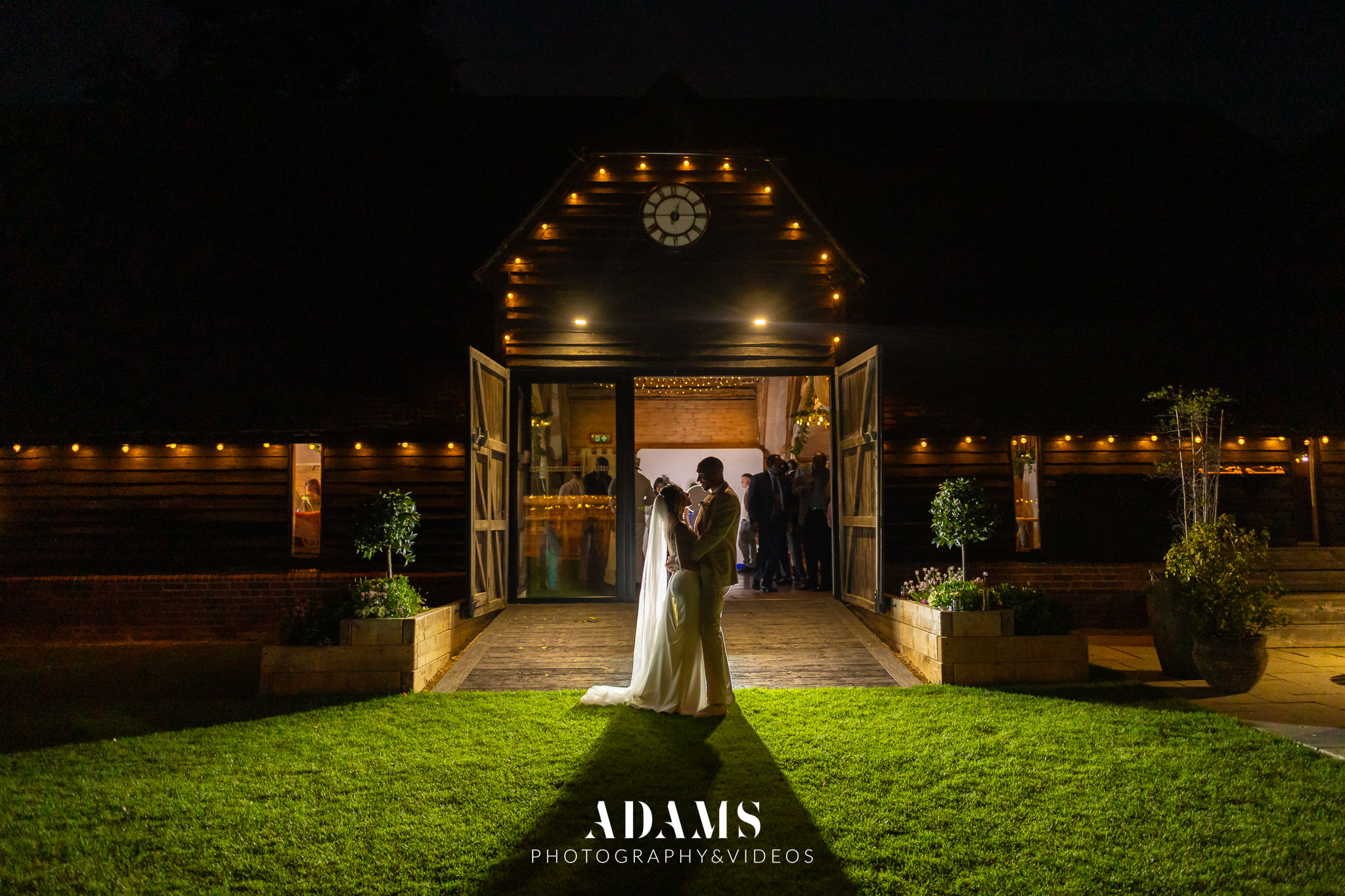 Married couple posing for the photo at Lains Barn